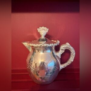 Elegant Silver Plated Teapot with Ornate Handle